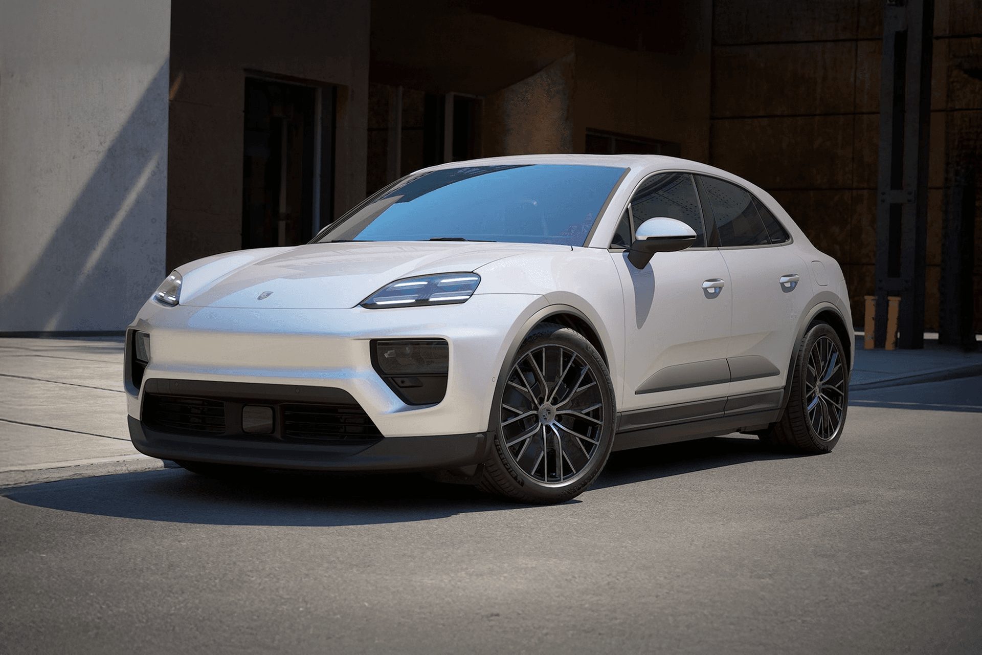 Außenansicht vom Macan 4 mit der Rückseite und der linken Seite des Fahrzeugs