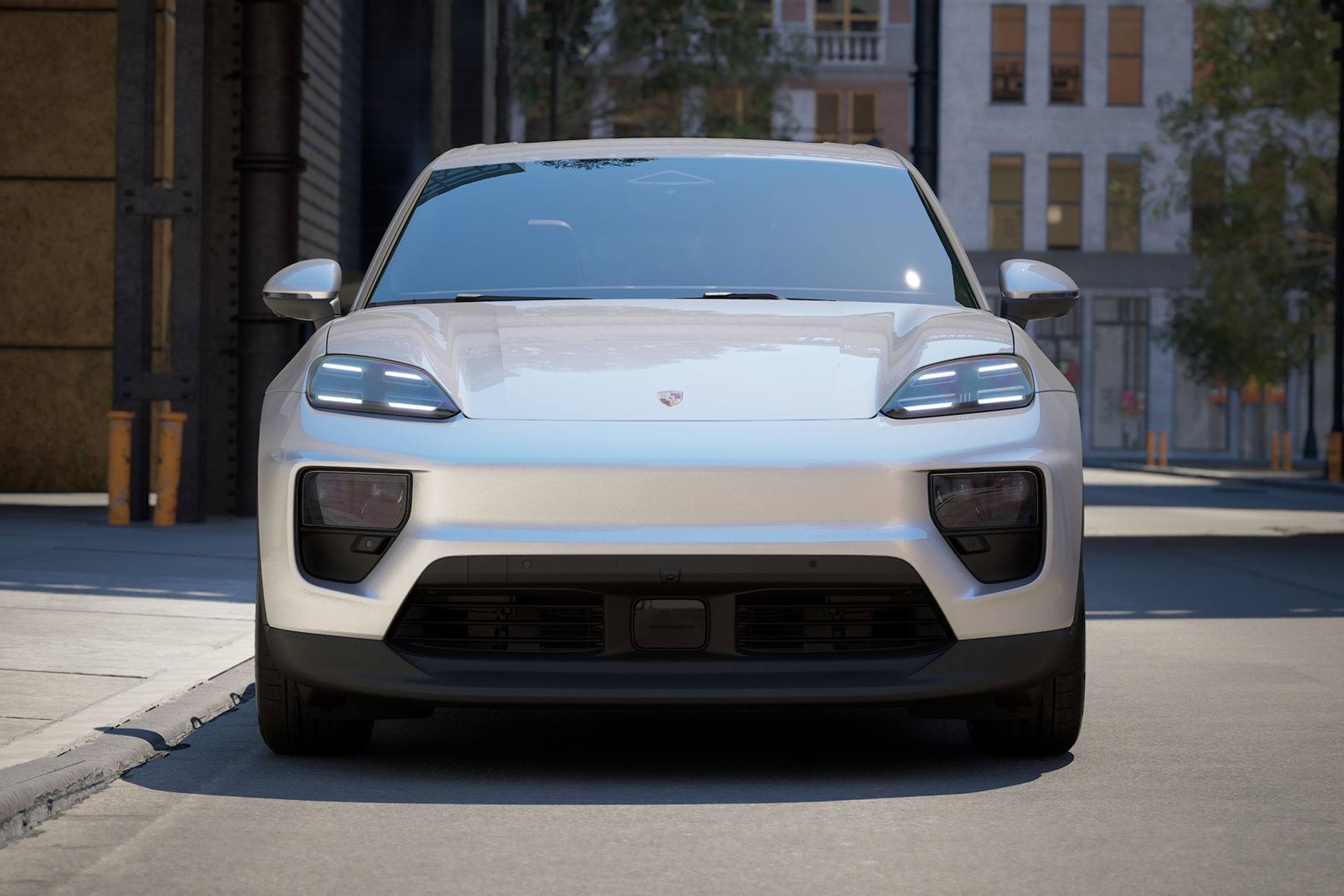 Porsche Macan 4 Ice Grey Metallic -mallissa kolmen neljänneksen näkymässä minimalistiseen betoniarkkitehtuuriin, jossa näkyvät LED-valot.
