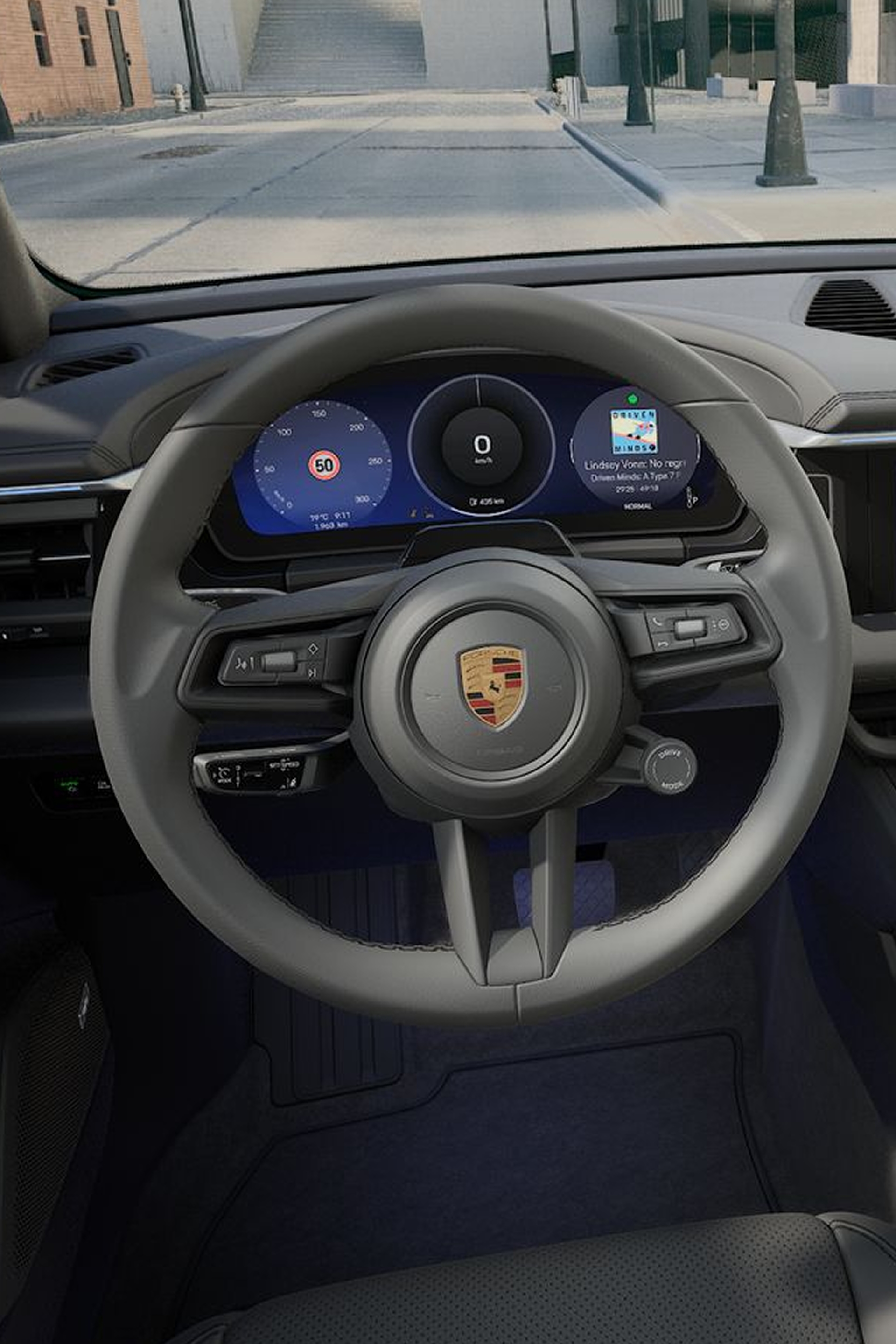 Porsche Macan 4 musta nahka sisustus, jossa on monitoiminen ohjauspyörä, digitaalinen näyttö ja minimalistinen ohjaamo, jossa on panoraamanäkymä katolle.