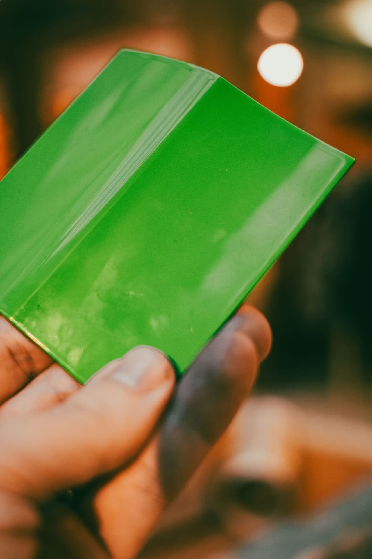 Tile painted with the Vipergreen exterior colour.